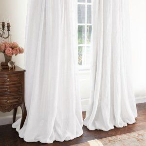 2 white linen curtain panels and 1 bed skirt